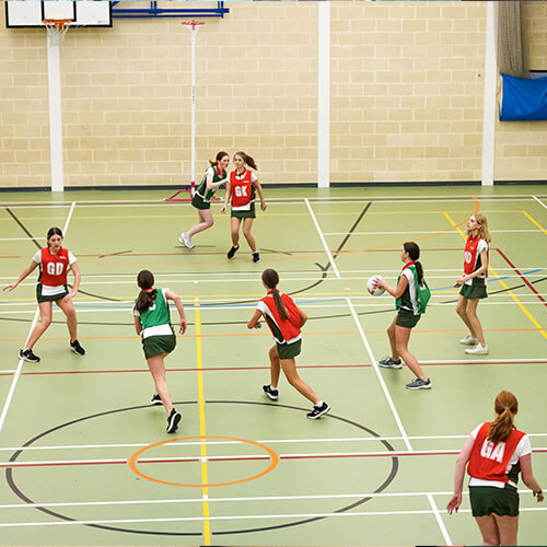 Students playing basketball