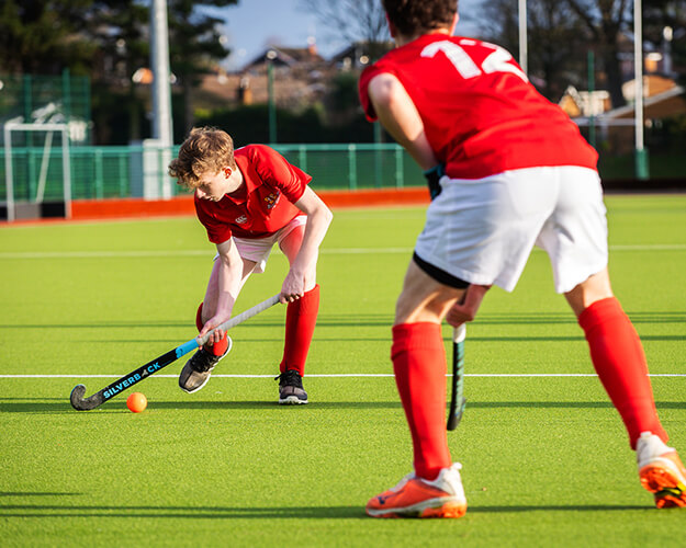 Students playing hockey