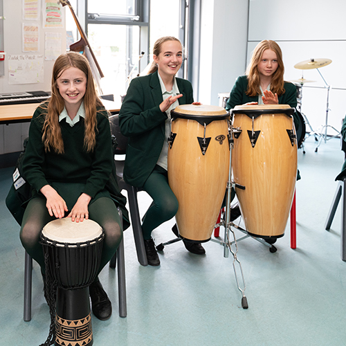 Students playing drums