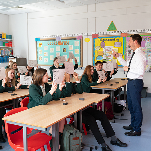 Classroom with students and a teacher