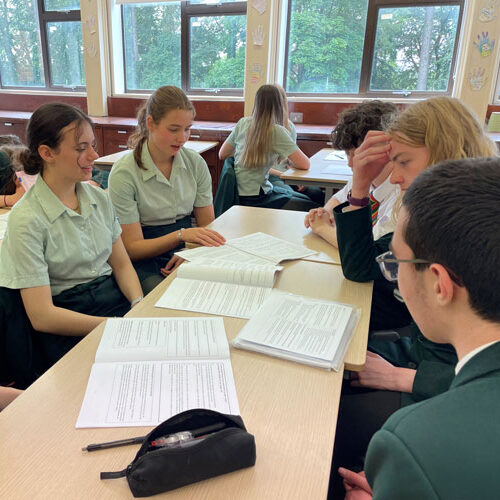 Students around a desk
