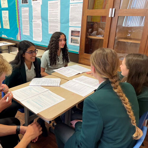 Students around a desk